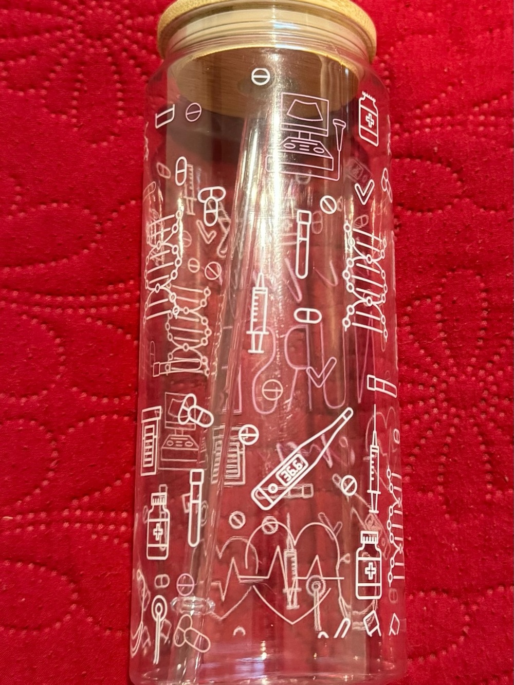 Clear Plastiv Water Bottle with White Medical Icons